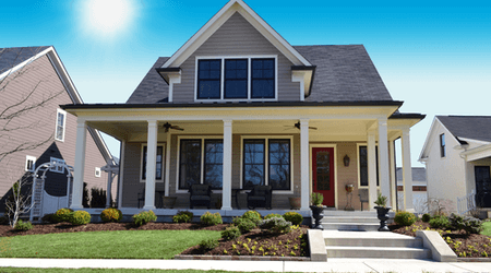 Front of a house on a sunny day